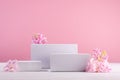 Spring gentle mockup with three white podiums for showing cosmetic product with hyacinth flowers and soft light pastel pink. Royalty Free Stock Photo