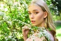 Spring girl face. Womens day with girl in white blossom. womens day holiday with girl in white flowers