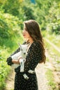 Spring girl with lamb. Goat milk. Sensual woman with goat. Animal, countryside. Friends with animals.