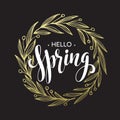 Spring handwritten calligraphy vector illustration, Black brushpen lettering phrase Hello Spring in golden wreath frame