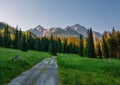 Spring hiking in the mountains. Mountain panorama of Javorova Valley in Slovakia with the peaks of the High Tatras Royalty Free Stock Photo