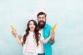 Spring holiday. Celebrate easter. Easter food. Girl and dad bunny ears. Happy family wear bunny ears. Easter fun and Royalty Free Stock Photo