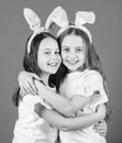 Spring holiday. Happy childhood. Friendship concept. Easter vibes. Happy easter. Holiday bunny girls with long bunny Royalty Free Stock Photo