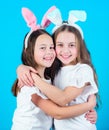Spring holiday. Happy childhood. Friendship concept. Easter vibes. Happy easter. Holiday bunny girls with long bunny Royalty Free Stock Photo