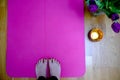 Spring inspired yoga training with flowers and candle