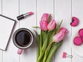 Spring items on wooden table, top view