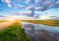 Spring landscape. Colorful blue cloudy sky reflected in water Royalty Free Stock Photo