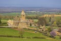 Spring landscape with cows and eglise Notre Dame de Lancharre, Bourgogne, France