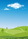 Spring Landscape Green fields,Mountain,Blue Sky and Clouds Background,Vertical peaceful rural nature Sunnyday Summer with grass Royalty Free Stock Photo