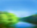 Spring landscape with meadows in the sunlight defocus blurred backdrop Royalty Free Stock Photo