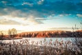 Spring landscape with melting ice on the lake on a clear day Royalty Free Stock Photo