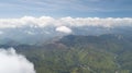 Spring landscape with the mountain peaks covered with snow and clouds Royalty Free Stock Photo