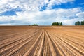 Spring of landscape with ploughed field Royalty Free Stock Photo