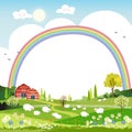 Spring landscape with rainbow,blue sky and clouds with raining, goats and sheep on green fields with copy space,Nature spring or Royalty Free Stock Photo