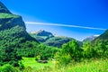 Spring landscape and red wooden buildings in Norway Royalty Free Stock Photo