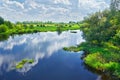 Spring landscape with river and clouds on the blue Royalty Free Stock Photo