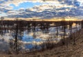 Spring landscape, sunset over the swollen river Royalty Free Stock Photo