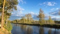 Spring landscape at the Ural river with birch, Russia Royalty Free Stock Photo