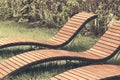 Spring loungers for relaxing in a public park Royalty Free Stock Photo