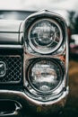 Spring meeting of owners of old cars in Hagfors-Sweden. Closeup of vintage car headlights