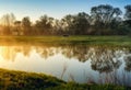 Morning. a picturesque foggy dawn by the river. Sun rays Royalty Free Stock Photo