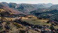 Spring mountains and hills landscape, Alpes Maritimes, Medieval village of Greolieres, drone aerial view