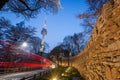 Spring on Namsan Mountain and traditional ancient walls and Namsan Tower, Seoul. South Korea Royalty Free Stock Photo