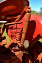 Spring and shock absorber of an old tractor seat Royalty Free Stock Photo