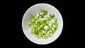 Spring onions and coriander roots on white bowl isolated background Royalty Free Stock Photo