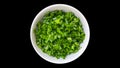 Spring onions on white bowl isolated background Royalty Free Stock Photo