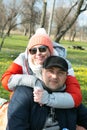 Spring outdoor portrait of a middle aged couple. Royalty Free Stock Photo