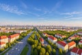 Spring panorama of the city overlooking residential areas and Frunze Street in the soft rays of the morning sun from a h