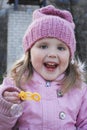 Spring in the park little girl blowing soap bubbles Royalty Free Stock Photo