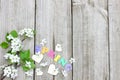 Spring pear tree blossoms and wood hearts border wood background Royalty Free Stock Photo