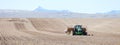 Spring Planting of potatoes in an Idaho farm field. Royalty Free Stock Photo