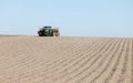 Spring Planting of potatoes in an Idaho farm field. Royalty Free Stock Photo