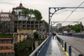 Spring in Portugal. The Duoro river and view of the rooftops of the port wine warehouses of the old city of Porto. Ponte LuÃÂ­s I.