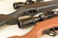 Spring powered modern airguns with scopes Royalty Free Stock Photo