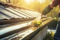 Spring Rain Gutters Cleaning Using Pressure Washer AI generated Royalty Free Stock Photo