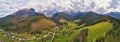 Spring rainy weather mountain panorama. Village in green forest hills. Road from Poland to Slovakia Royalty Free Stock Photo