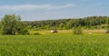 Poland Ostrowiec Swietokrzyski June 1, 2023 at 11:59. Tractor with a CLAAS Rollant 250 Roto hay baler attached.