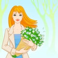 Spring. the red-haired woman with snowdrops