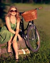 Spring, relax and bicycle with woman in park for cycling, freedom and nature. Happy, smile and peace with female and Royalty Free Stock Photo