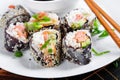 Spring roll with nori, sushi rice, salmon, cucumber and avocado, sriracha Royalty Free Stock Photo