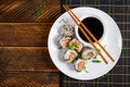 Spring roll with nori, sushi rice, salmon, cucumber and avocado, sriracha Royalty Free Stock Photo