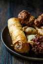 Spring Rolls with Samosas / Samsa with  Chicken Pakora and Aloo Tikki Royalty Free Stock Photo