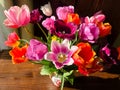 Spring romantic bouquet with garden colorful tulips in the interior Royalty Free Stock Photo