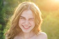 Spring romantic young woman portrait. Young teen woman with clean fresh skin. Close up portrait of smiling teenager Royalty Free Stock Photo