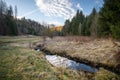 Spring romantic landscape with creek and bridge at sunrise Royalty Free Stock Photo