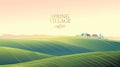 Spring rural landscape with hills and fields and village, on top of a hill. Royalty Free Stock Photo